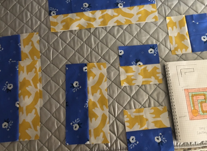 Sewing together pieces of my quilt